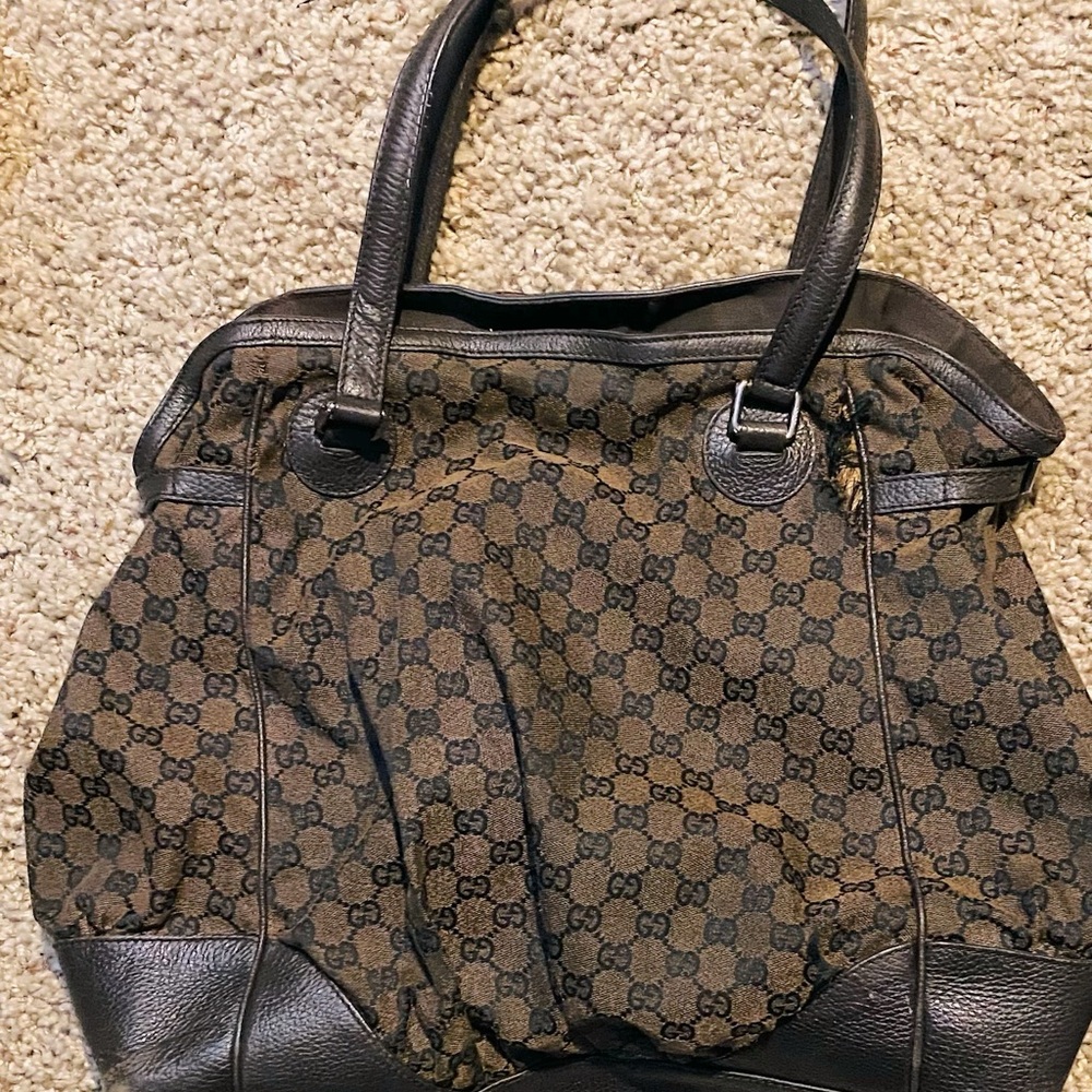 Large Brown Gucci bag.
